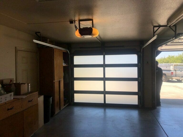 A Black Frosted Full View Garage Door from inside with opener