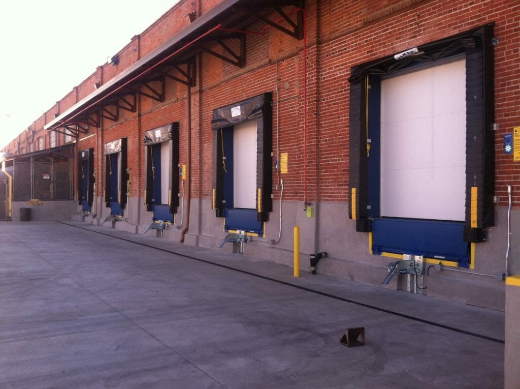 Dock Doors, seals, and levelers in a brick building