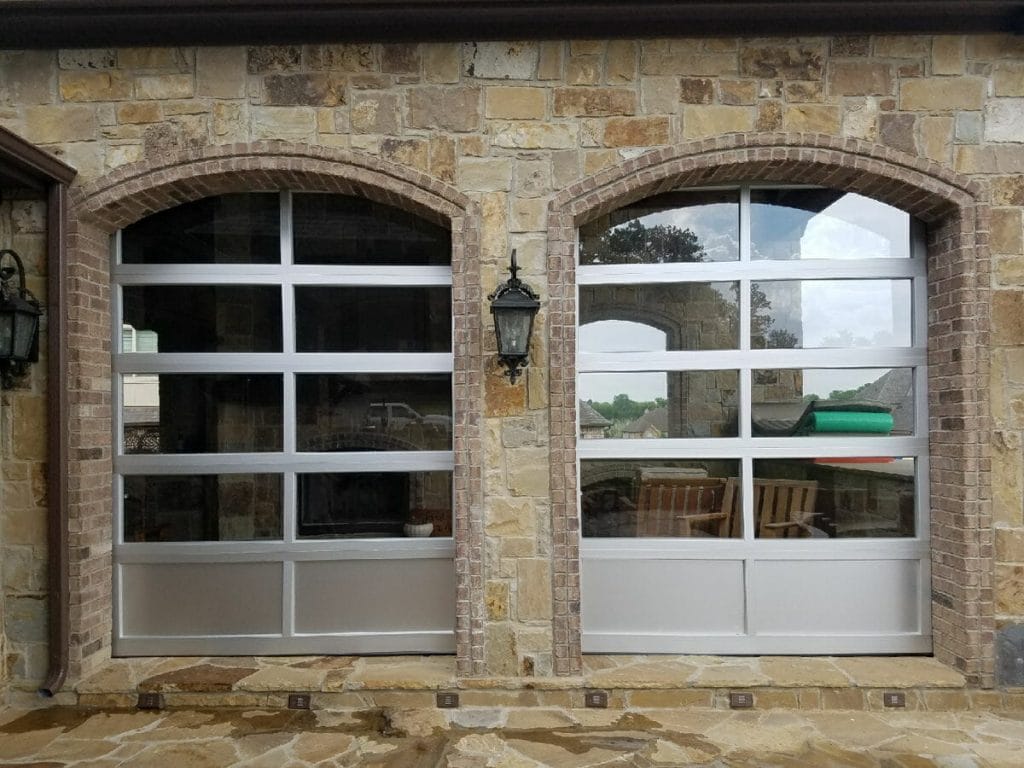 Two small aluminum full view doors installed