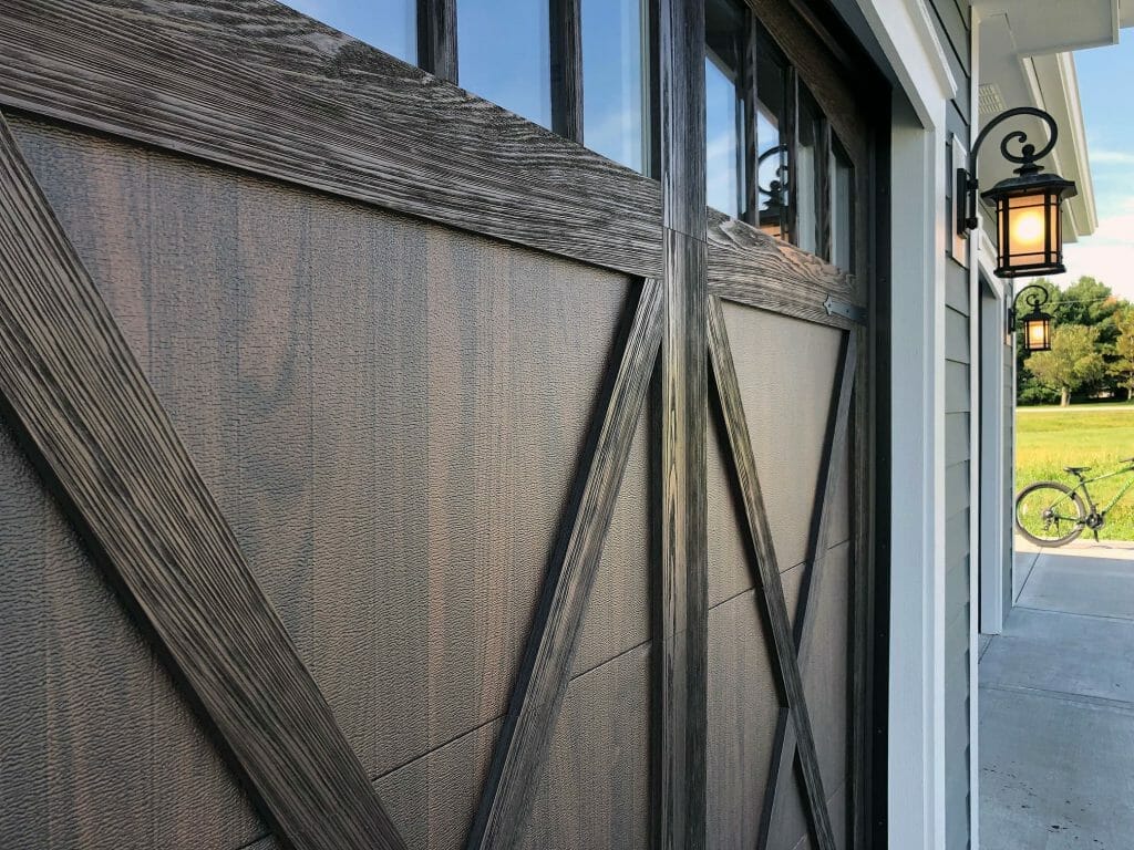 Closeup of the wood grain detail in a CHI shoreline garage door.
