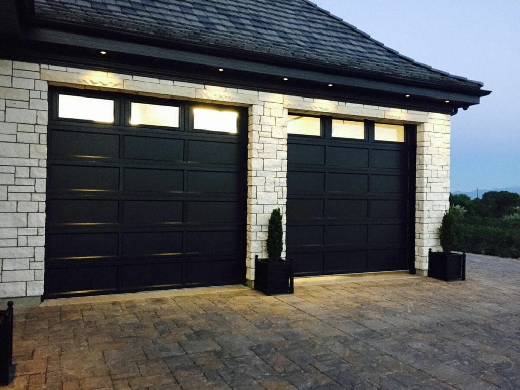 Two black Recessed Panel garage door