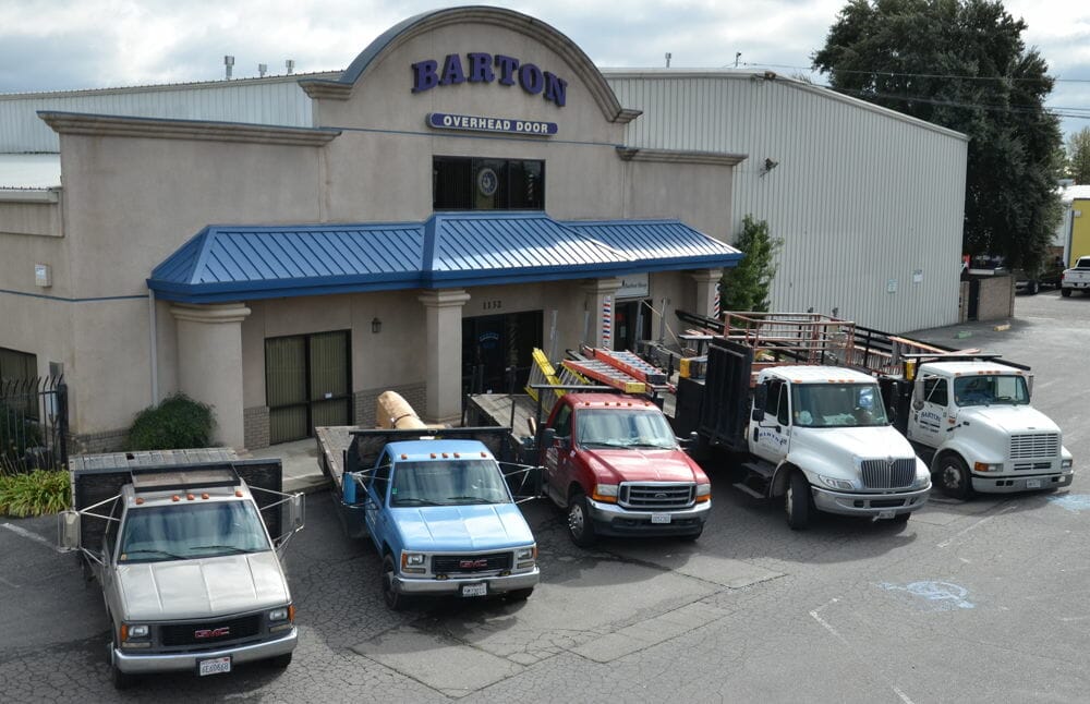 Front of our Modesto Showroom with trucks parked in a row.