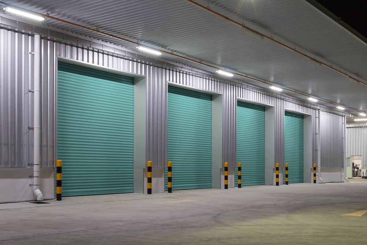 A row of green Rolling curtains installed in a building