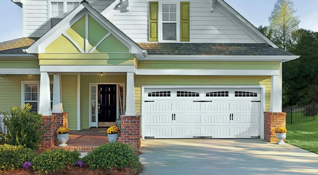 Amarr Heritage Carriage House garage doors installed on a house.